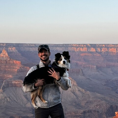 Ken Brielmaier and his Australian Shepherd, Penny, at the Grand Canyon